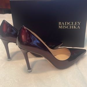 Stunning Bagley Mischka wine colored patent leather shoe with rhinestones.
